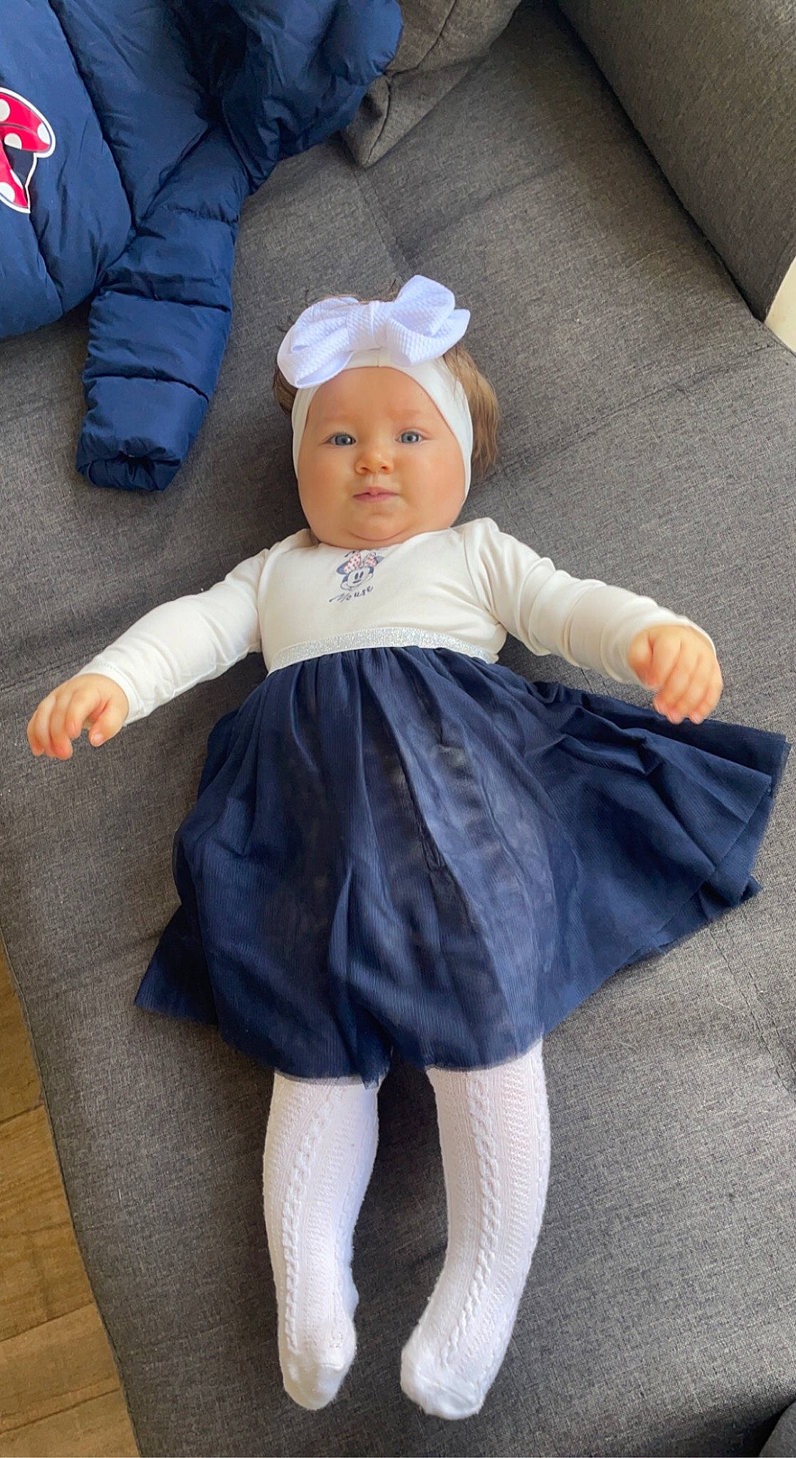 Kayla participe au concours pour gagner de l'argent avec cette photo : baby, baby_toddler_clothing, child, comfort, costume, costume_accessory, day_dress, electric_blue, embellishment, fashion_accessory, hat, headwear, human_leg, pattern, person, sitting, sleeve, sock, textile, toddler