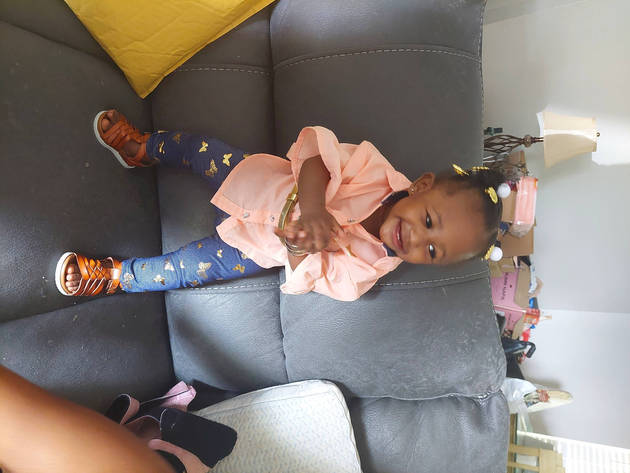 Ivory is registered to the contest to win money with this photo: auto_part, baby, baby_products, baby_toddler_clothing, car_seat, child, comfort, fashion_accessory, finger, hat, human_leg, joy, knee, lap, leg, person, purple, room, sitting, sock