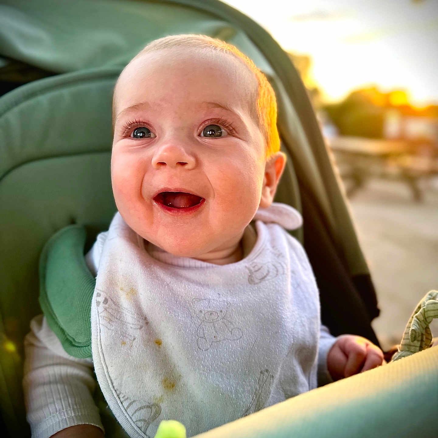 Flynn is registered to the contest to win money with this photo: baby, babylaughing, clothing, face, glove, happy, head, laughing, person, photography, portrait, smile