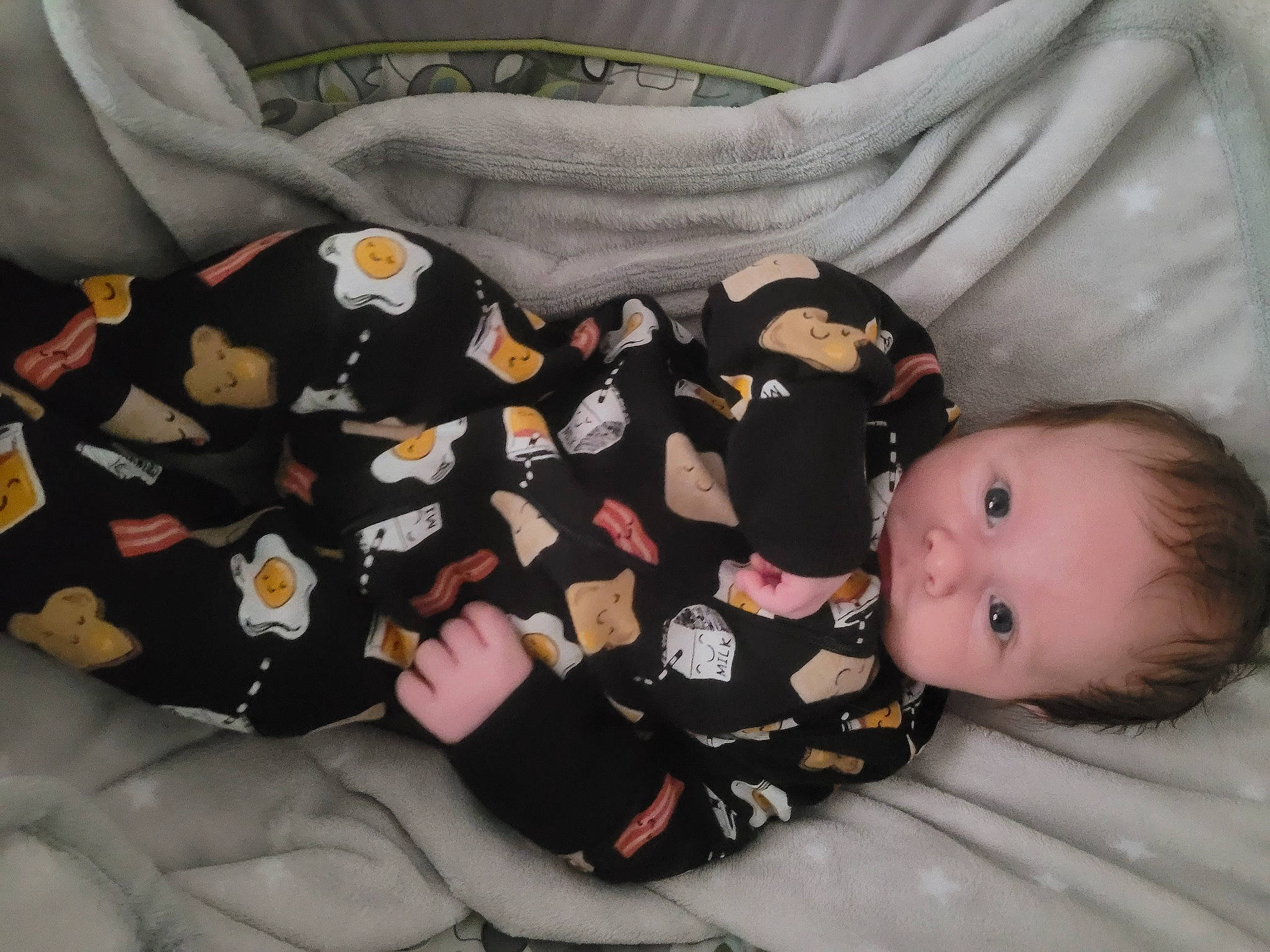 Arrow is registered to the contest to win money with this photo: baby, baby_products, baby_toddler_clothing, cheek, child, comfort, linens, pattern, person, product, sitting, sleeve, textile, toddler