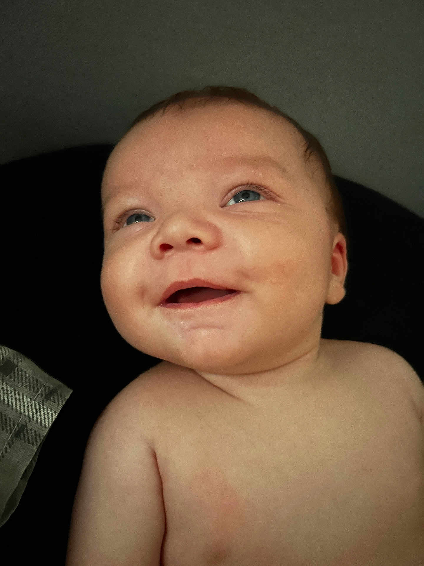 Grayson is registered to the contest to win money with this photo: baby, infant, smile, face, blue_eyes, cheeks, skin, portrait, closeup, happy, looking_up, bare_shoulders, child, cute, expression, human, person, newborn, indoors, head