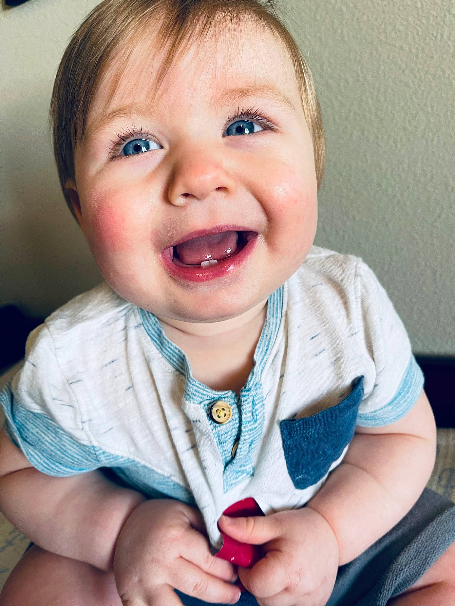 Waylon is registered to the contest to win money with this photo: arm, baby_toddler_clothing, cheek, chin, dress, facial_expression, finger, gesture, hand, happy, iris, lip, mouth, neck, nose, person, product, skin, sleeve, smile