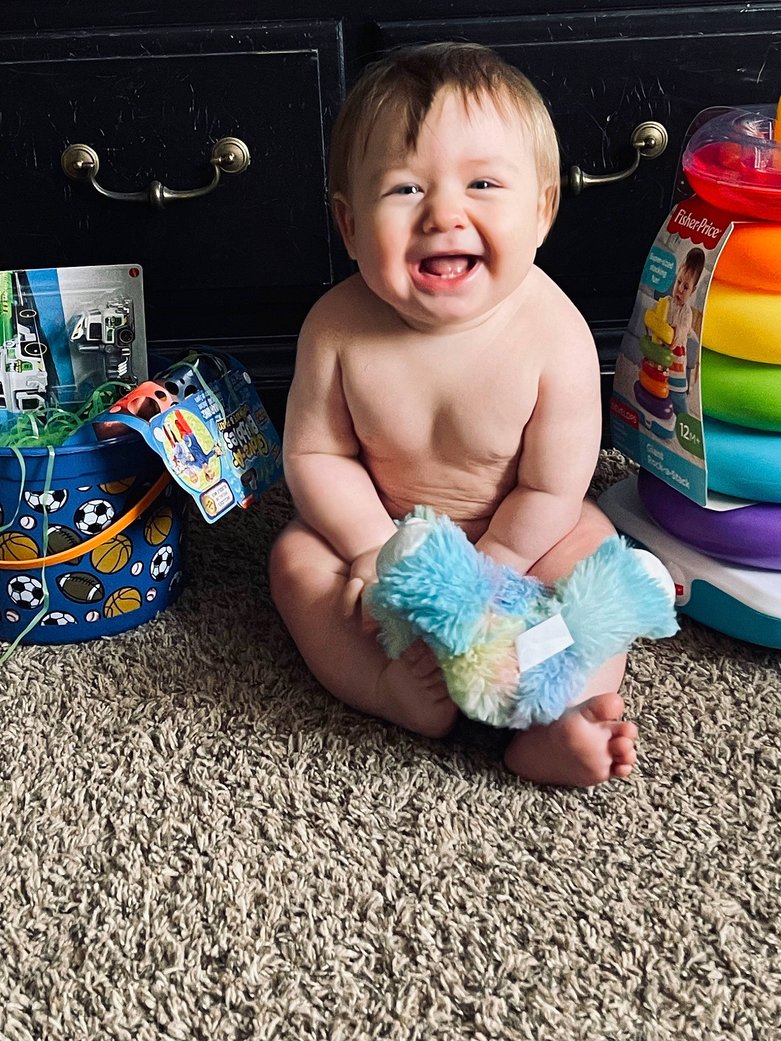 Waylon is registered to the contest to win money with this photo: baby, baby_playing_with_toys, baby_products, baby_toddler_clothing, child, electric_blue, face, finger, foot, fun, hairstyle, happy, human_body, person, product, sitting, smile, t_shirt, thumb, toddler