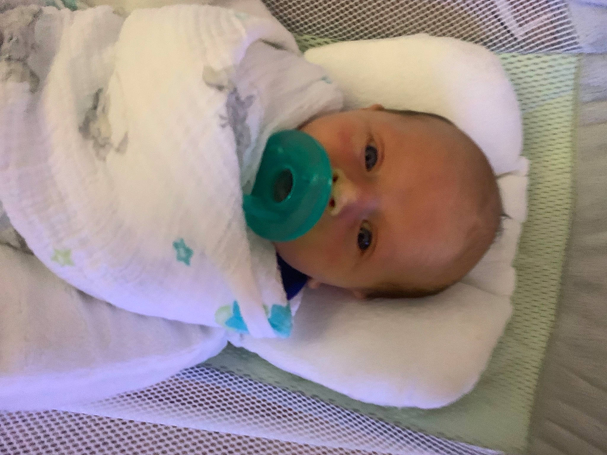 Wyatt is registered to the contest to win money with this photo: baby, baby_products, baby_safety, baby_toddler_clothing, bedtime, child, comfort, eye, hat, hospital, human_body, linens, person, room, toddler