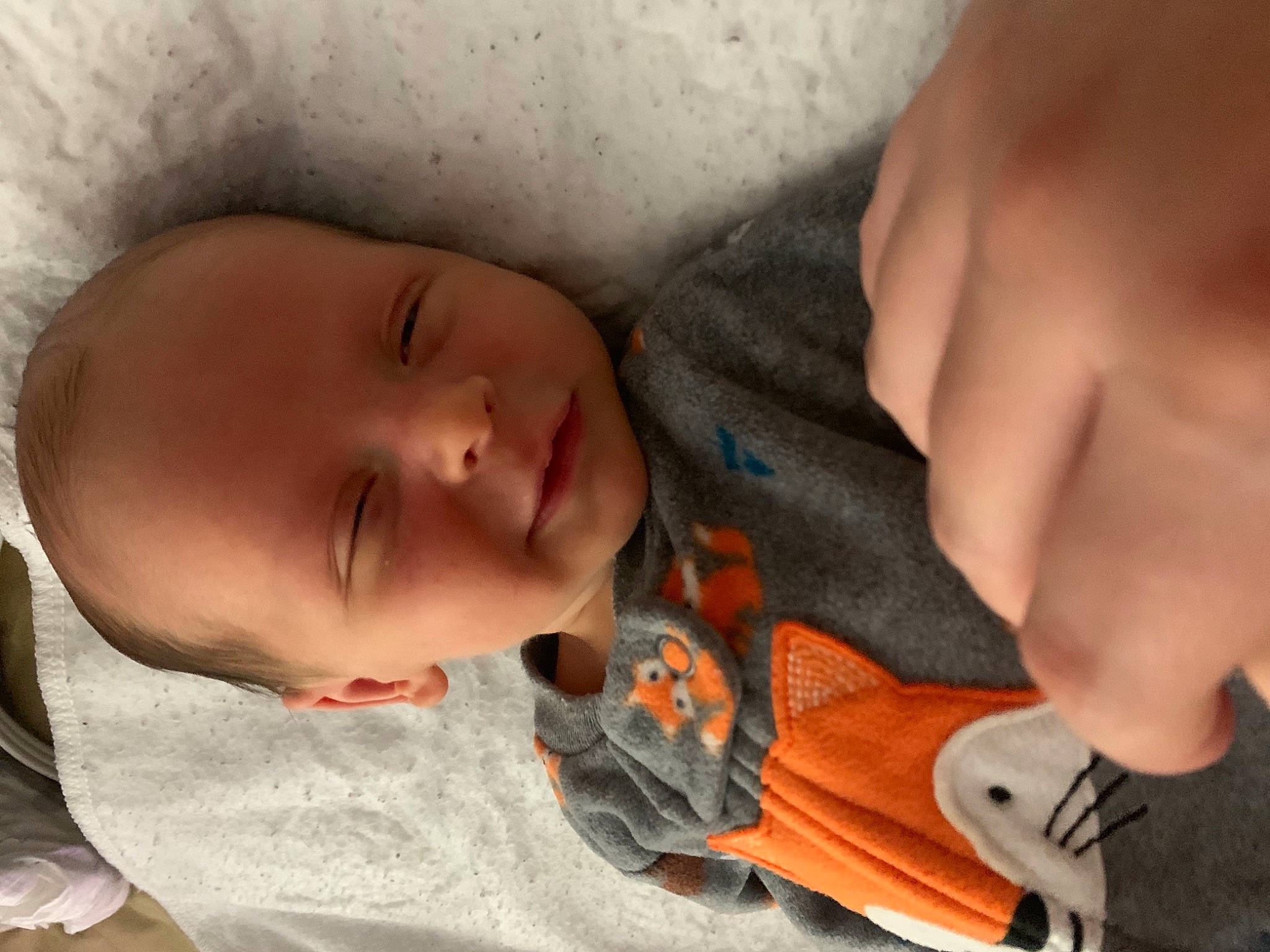 Wyatt is registered to the contest to win money with this photo: arm, baby, baby_products, baby_toddler_clothing, cheek, child, comfort, ear, eyebrow, finger, forehead, hand, happy, lip, mouth, neck, nose, person, skin, smile