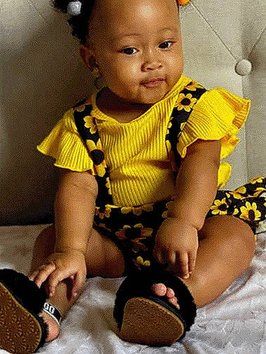 Kori is registered to the contest to win money with this photo: baby, baby_toddler_clothing, black, cheek, eye, face, facial_expression, hairstyle, happy, head, human_body, iris, mouth, organ, person, photograph, product, skin, sleeve, toddler