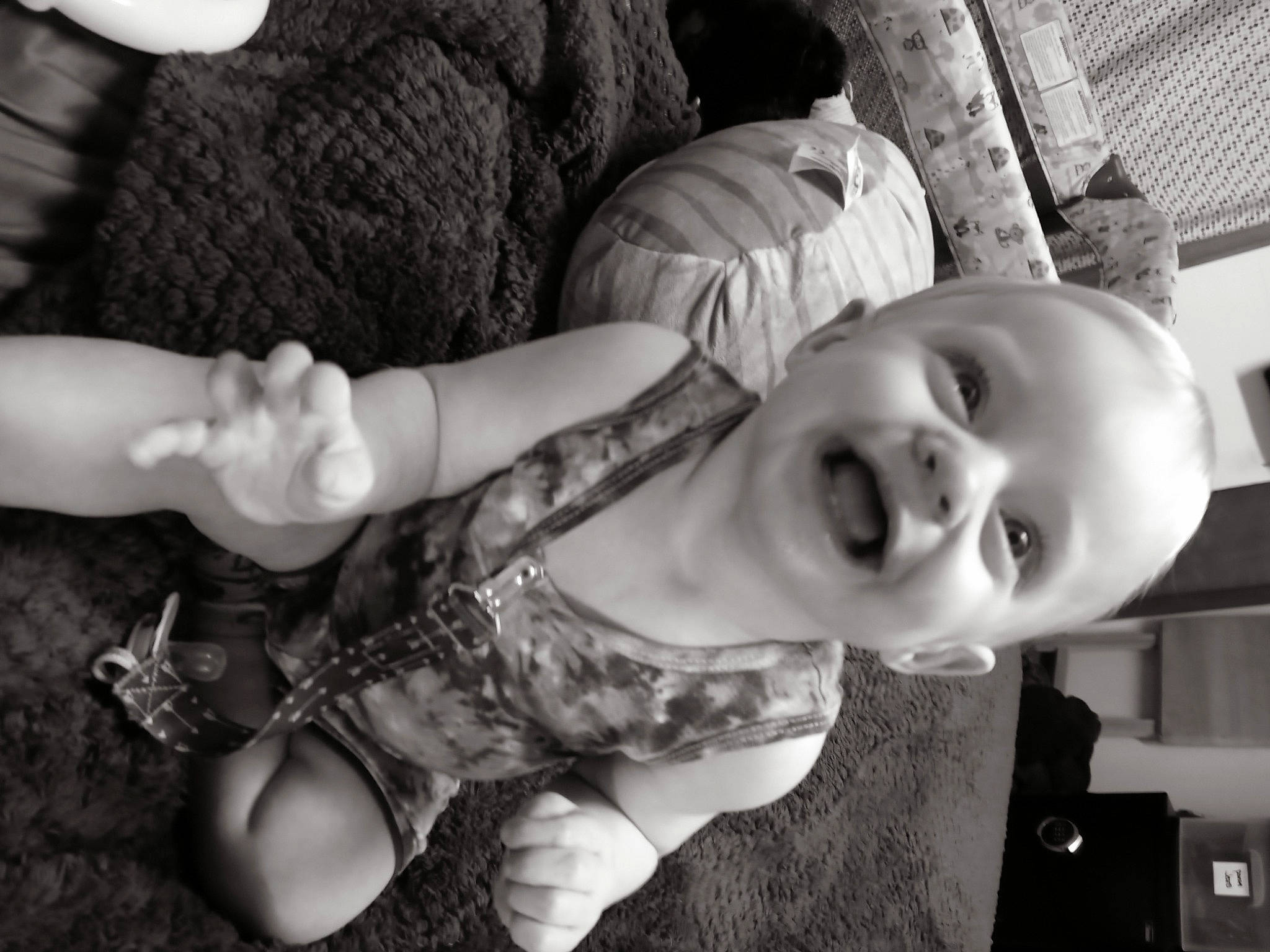 Ricky is registered to the contest to win money with this photo: black, black_and_white, eye, finger, flash_photography, fun, gesture, hand, happy, human_body, iris, leg, mouth, person, plant, skin, smile, style, toddler, white