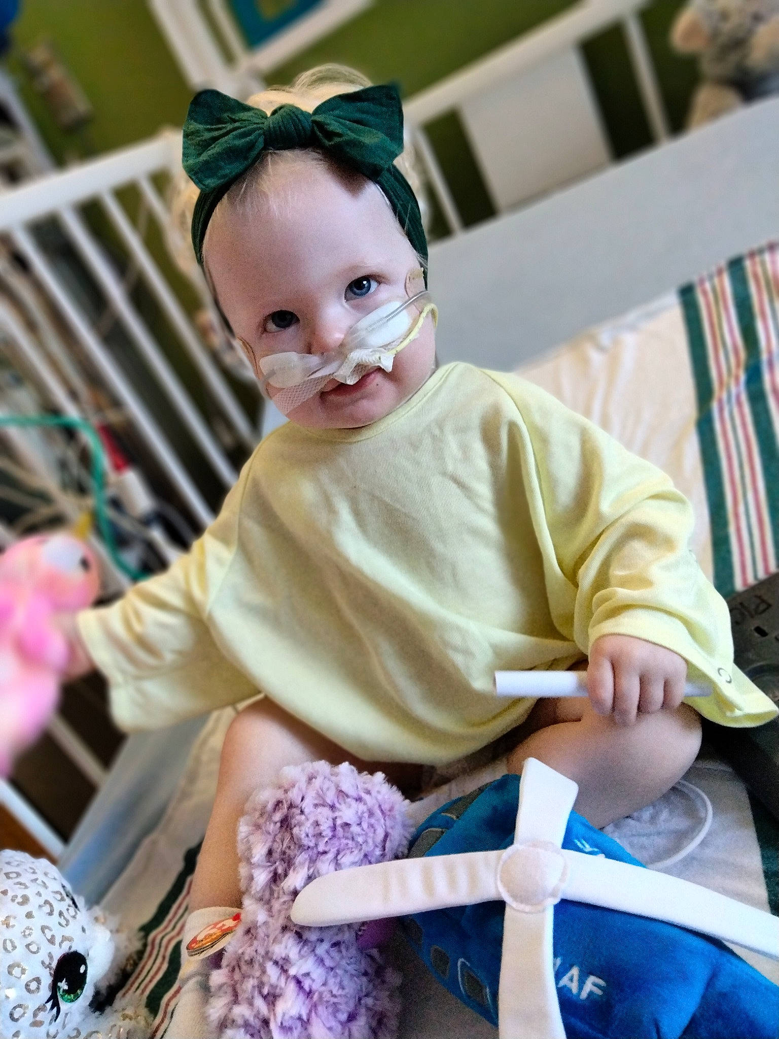 Kailah joined the competition — help win amazing prizes! baby, baby_products, baby_toddler_clothing, blue, child, costume, event, eyewear, facial_expression, fun, happy, leisure, magenta, person, pink, purple, room, sitting, smile, toddler