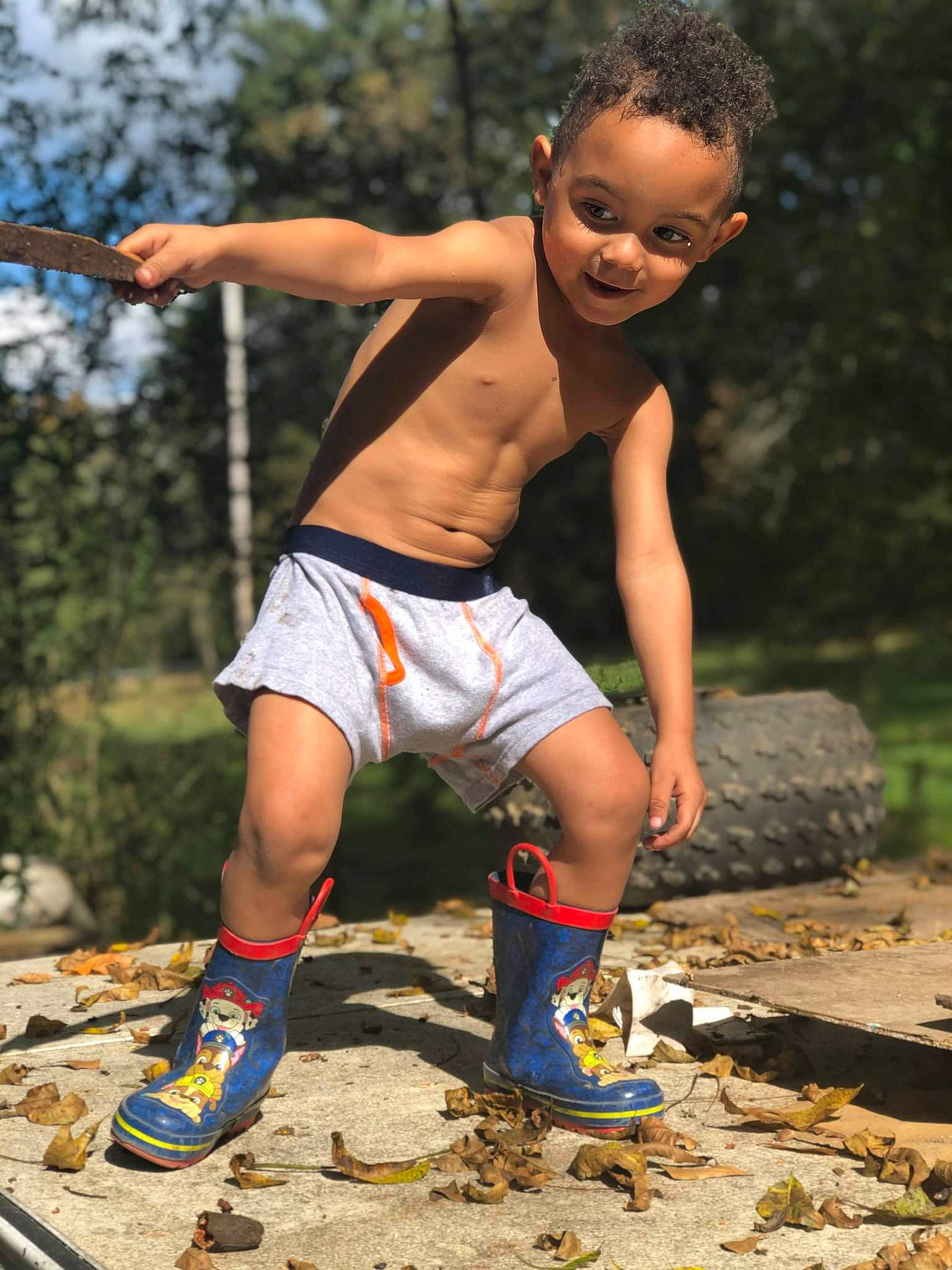 Kaydinn is registered to the contest to win money with this photo: barechested, chest, child, flash_photography, fun, grass, happy, head, joy, leisure, people_in_nature, person, plant, recreation, shoe, shorts, sneakers, summer, thigh, toddler
