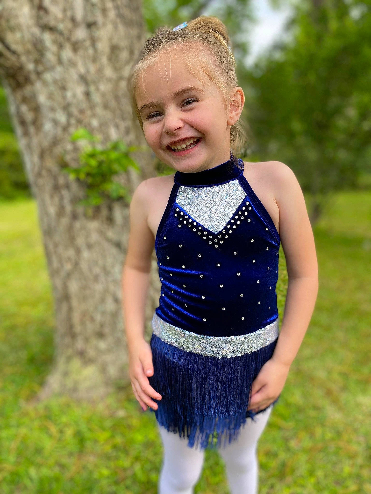 Maddie joined the competition — help win amazing prizes! abdomen, baby_toddler_clothing, blond, child, electric_blue, face, grass, hair, happy, head, human_leg, joy, pattern, person, plant, shoulder, sleeve, smile, thigh, toddler