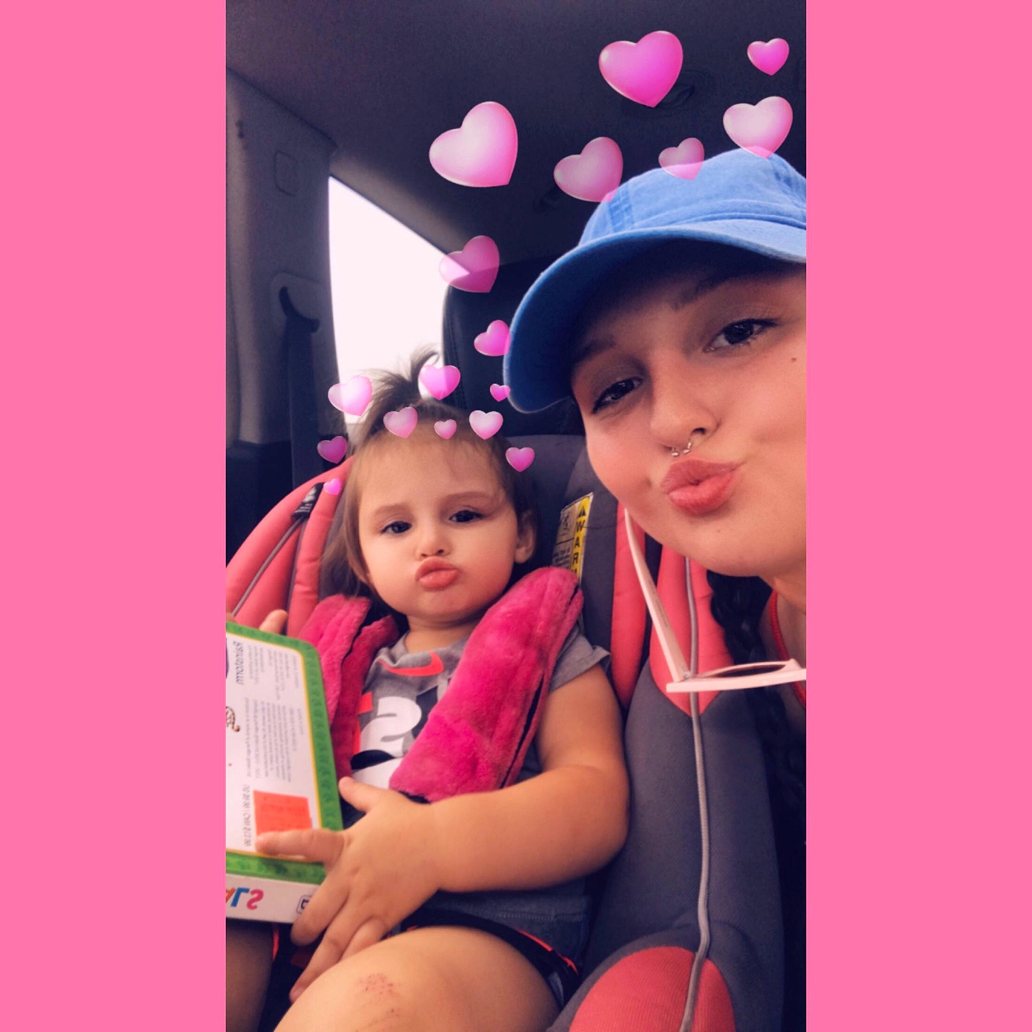 Aviah Bleu is registered to the contest to win money with this photo: black_hair, cheek, child, daughter, ear, happy, head, headwear, human, magenta, neck, person, photography, pink, plant, selfie, skin, smile, snapshot, toddler