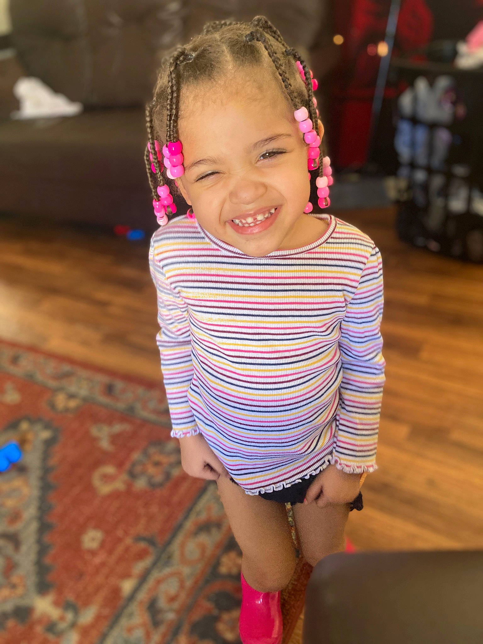 Alaiyah joined the competition — help win amazing prizes! baby_toddler_clothing, child, face, facial_expression, flooring, fun, hair_tie, hairstyle, happy, head, joy, magenta, neck, pattern, person, pink, skin, sleeve, smile, t_shirt