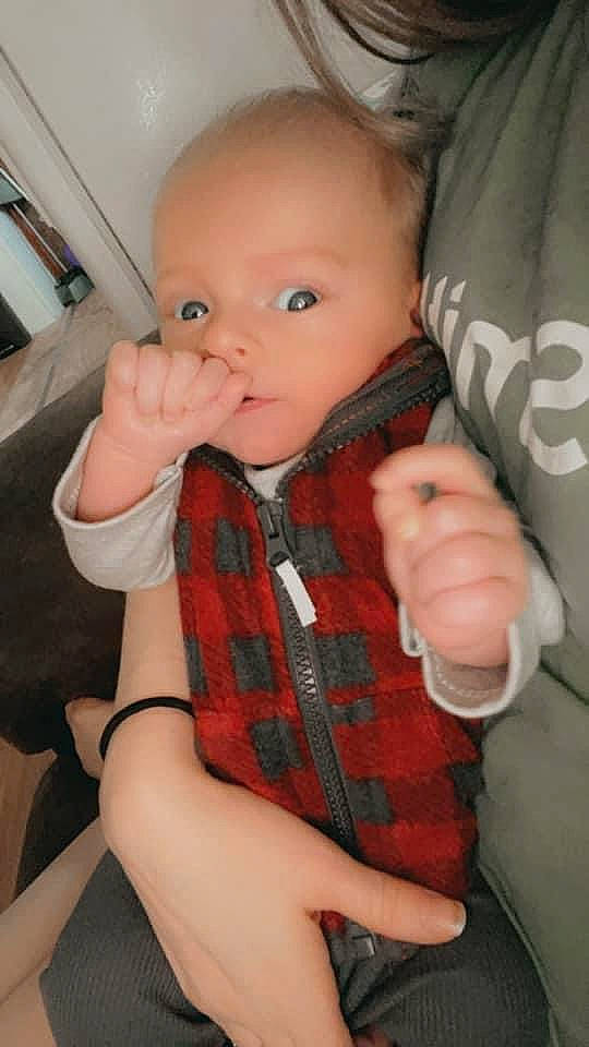 Miles joined the competition — help win amazing prizes! arm, baby, cheek, chin, ear, eye, eyebrow, finger, gesture, hair, hand, head, iris, lip, neck, nose, person, skin, sleeve, tartan