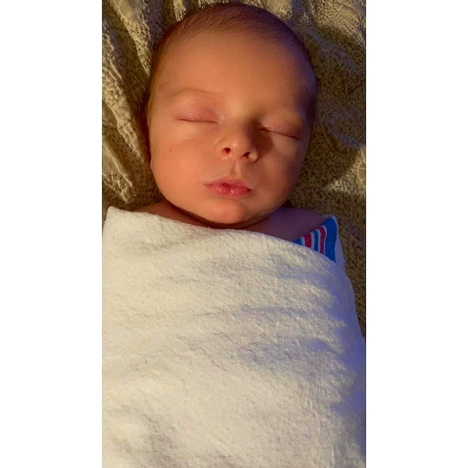 Miles is registered to the contest to win money with this photo: baby, baby_sleeping, baby_toddler_clothing, bedding, bedtime, cheek, child, cloud, comfort, eyebrow, fur, happy, linens, nap, nose, person, portrait_photography, room, sleeve, t_shirt