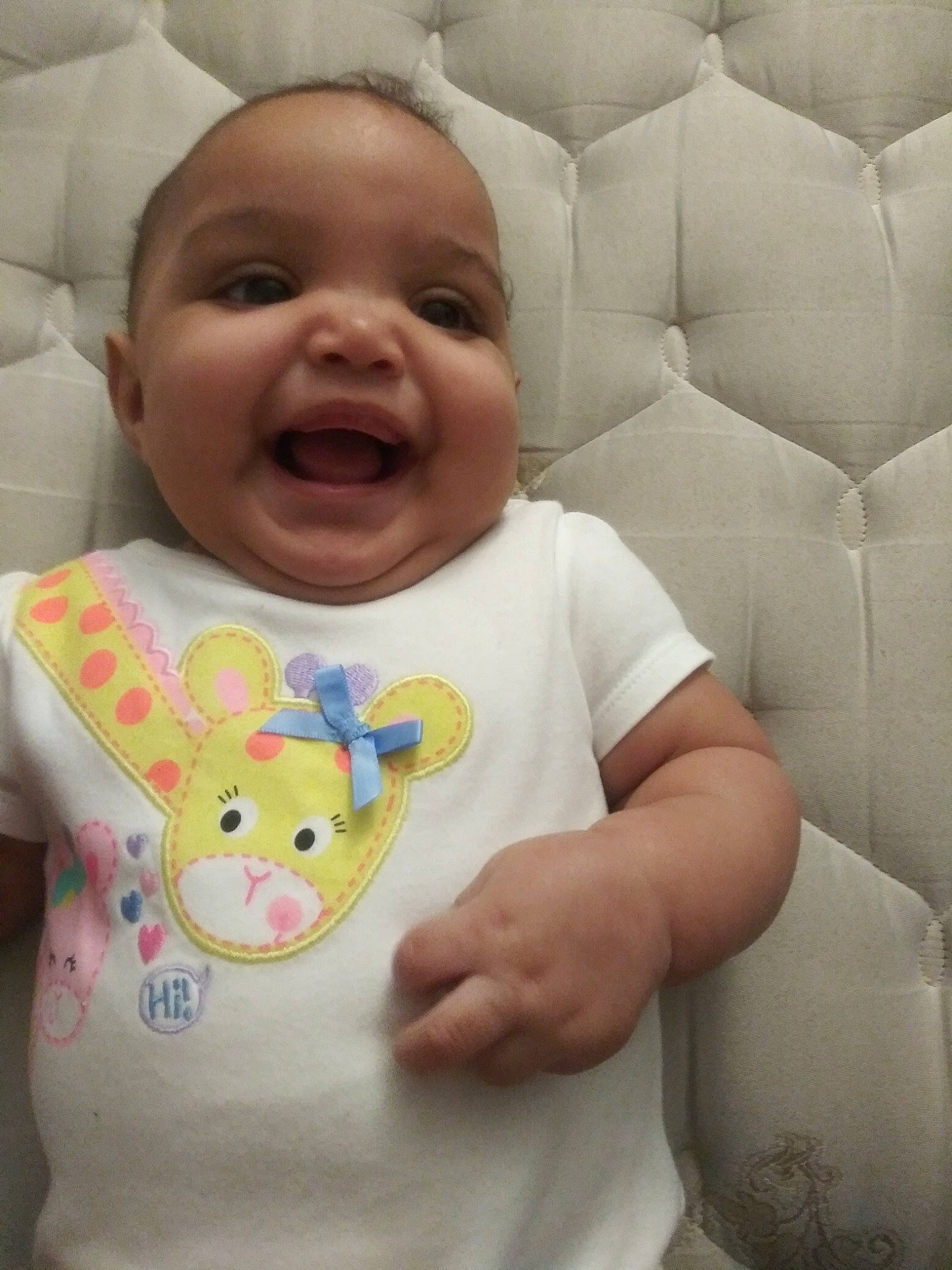 Constance joined the competition — help win amazing prizes! baby, cheek, child, face, facial_expression, head, nose, person, skin, smile, textile, toddler, yellow