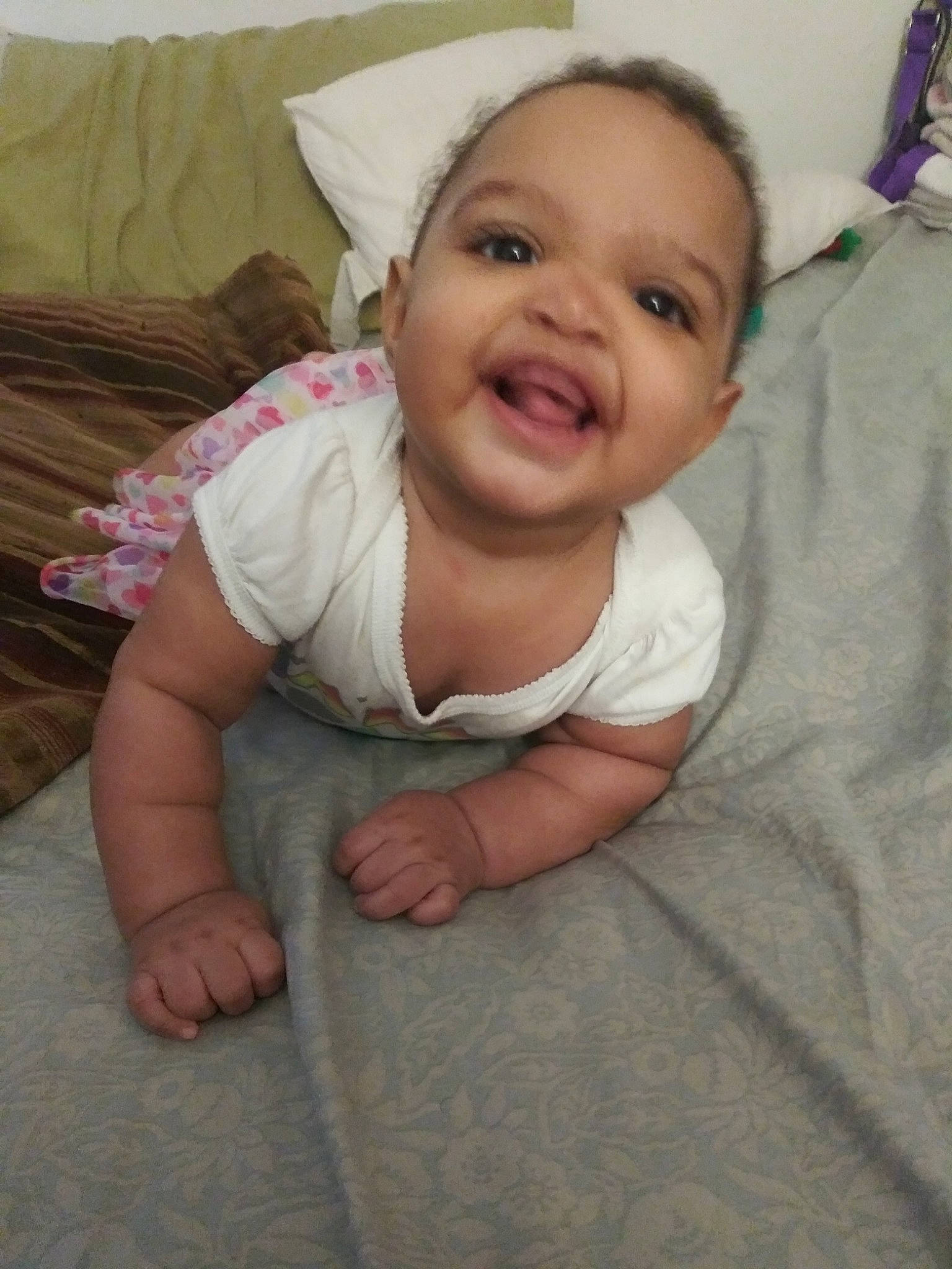 Constance is registered to the contest to win money with this photo: baby, cheek, child, eye, face, facial_expression, happy, head, iris, laugh, lip, mouth, nose, person, skin, smile, toddler