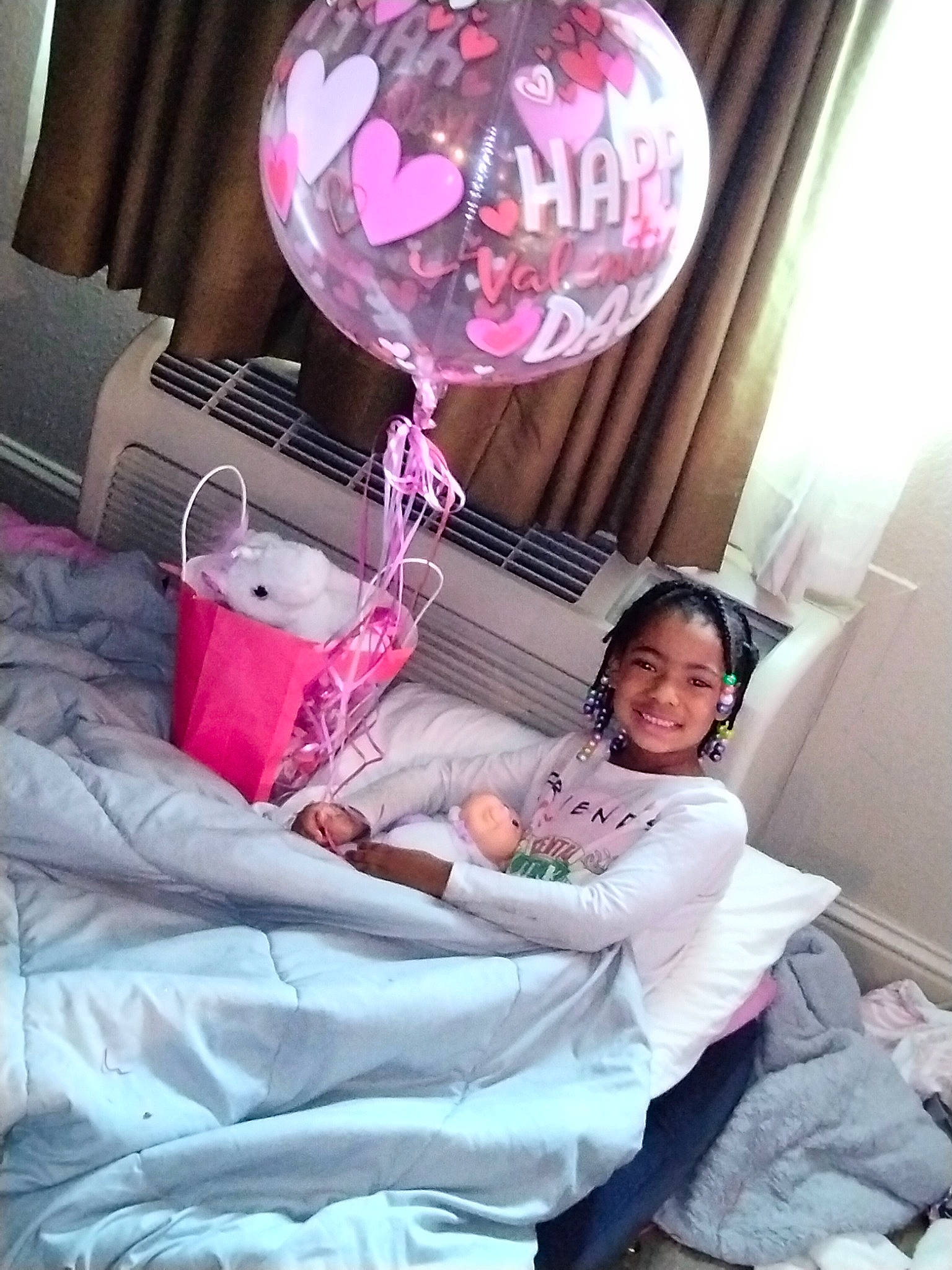 Za' Mya joined the competition — help win amazing prizes! balloon, bedding, child, circle, comfort, event, health_care, hospital_bed, joy, linens, magenta, medical_equipment, medical_procedure, patient, person, pink, purple, room, service, smile