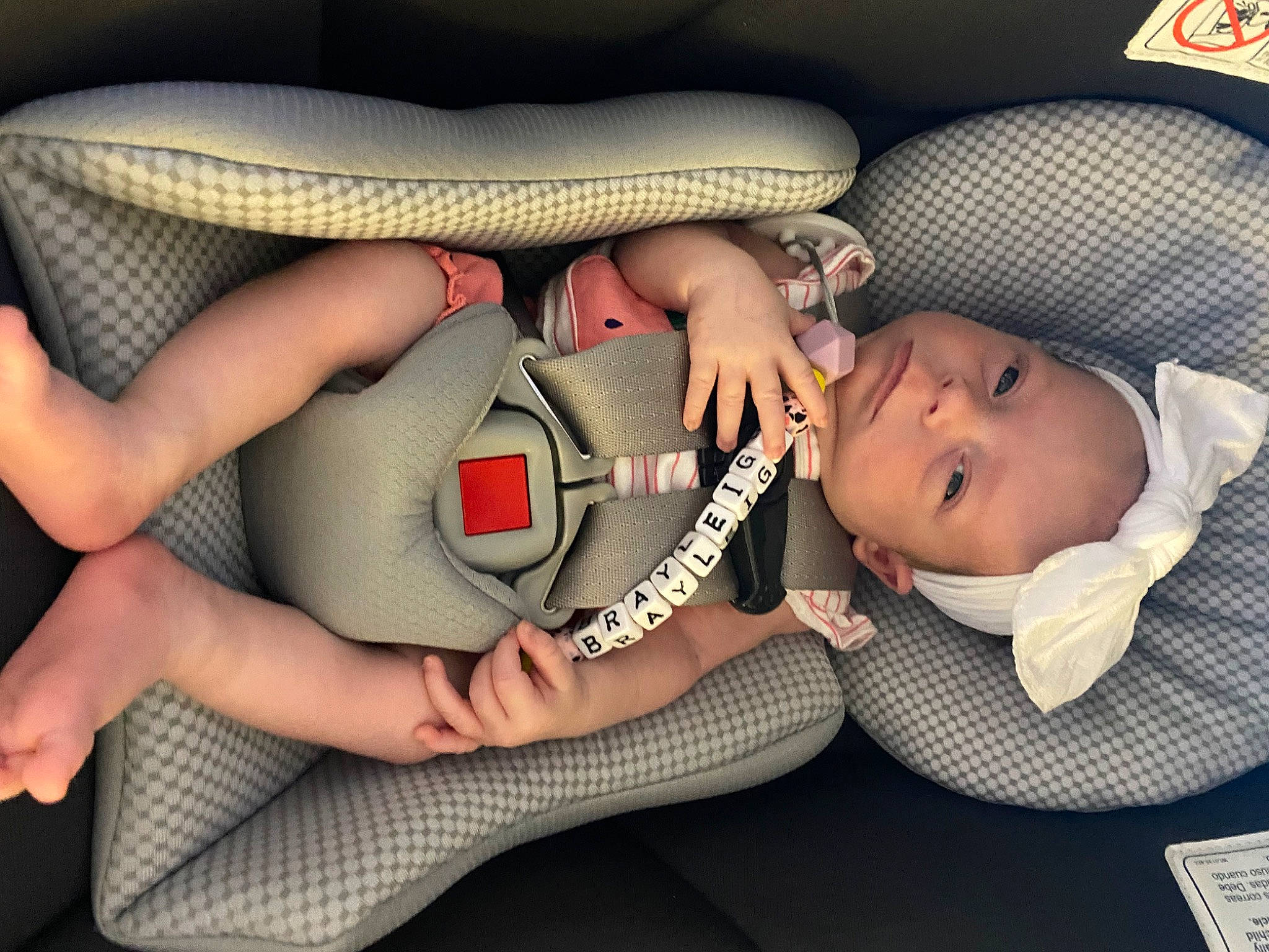 Brayleigh joined the competition — help win amazing prizes! baby, baby_products, baby_sleeping, baby_toddler_clothing, chest, child, comfort, elbow, eyelash, finger, gesture, headgear, human_leg, knee, mouth, nail, pattern, person, thigh, toddler