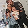 Elio participe au concours pour gagner de l'argent avec cette photo : baby, beard, cap, casual, clothing, family, furniture, glasses, holding_baby, indoor, light, man, mirror, modern_interior, purse, selfie, smile, tile_floor, tongue_out, woman