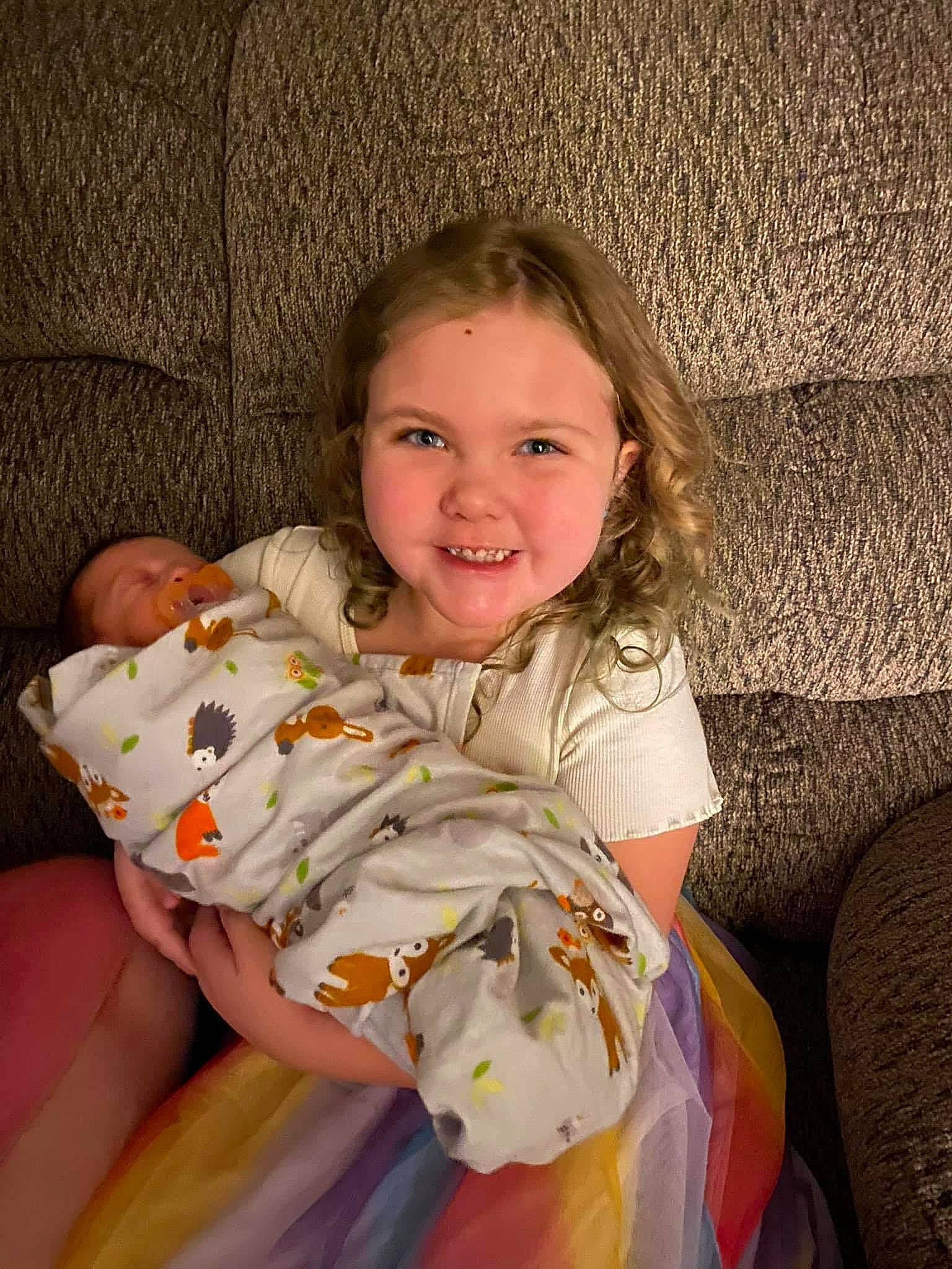 Elena is registered to the contest to win money with this photo: abdomen, baby_toddler_clothing, cheek, comfort, eye, face, facial_expression, fun, hair, hairstyle, happy, head, human_body, iris, joy, mouth, nose, person, skin, smile