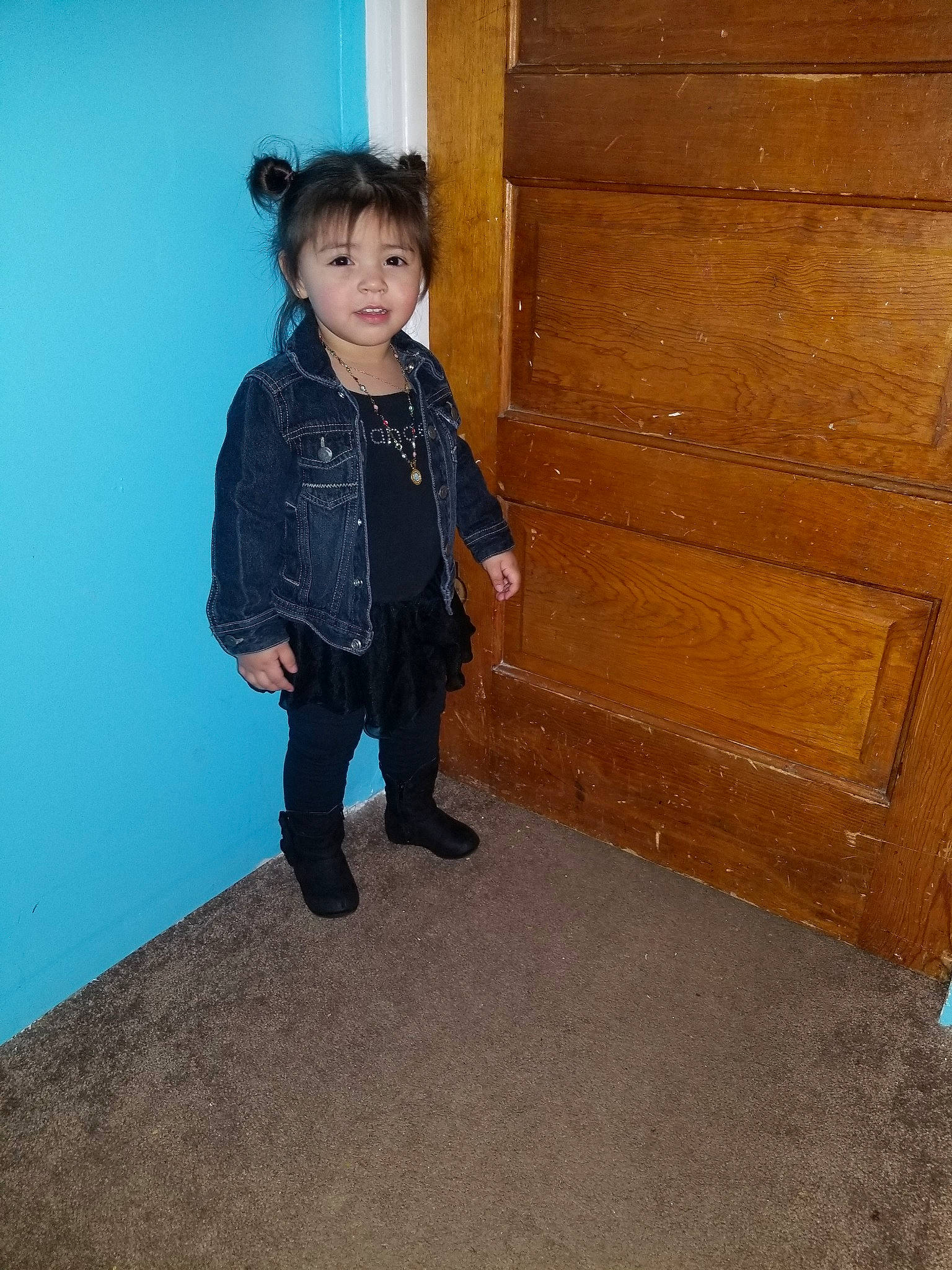 Sarahi is registered to the contest to win money with this photo: child, floor, flooring, leg, person, sitting, smile, standing, toddler