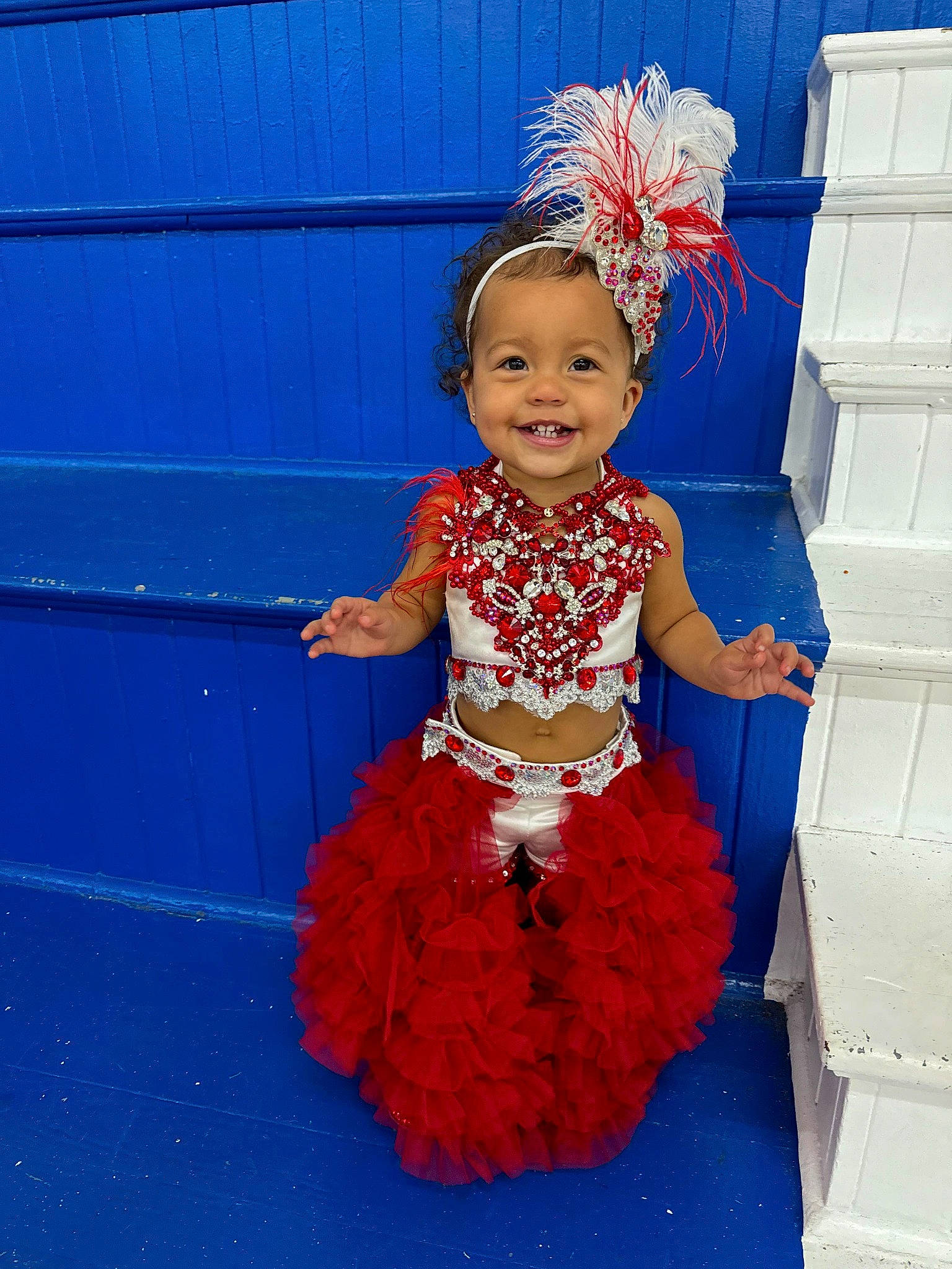 Amora joined the competition — help win amazing prizes! baby_toddler_clothing, blue, child, clothing, costume, costume_hat, electric_blue, event, fun, happy, hat, joy, magenta, party_supply, pattern, person, pink, purple, red, ruffle