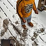 Kharlee joined the competition — help win amazing prizes! child, snow, outdoor, wooden_deck, winter, clothing, orange_shirt, smiling, happy, footprints, video_call, screen_overlay, person, blur, cold, boots, wood, playful, casual, daylight