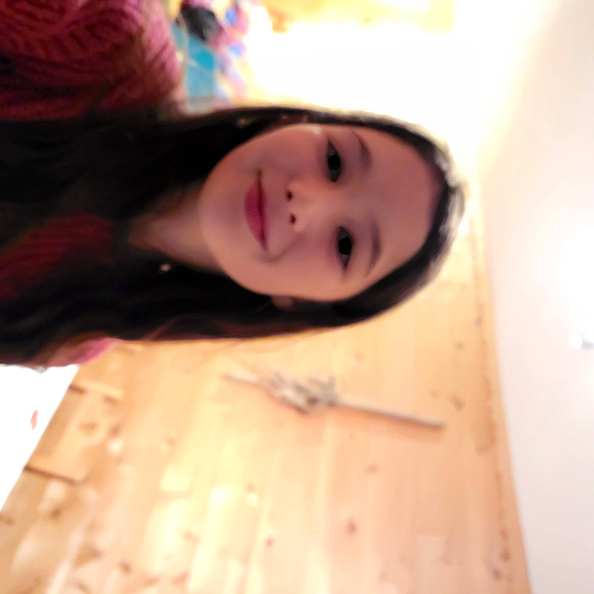 Natasha participe au concours pour gagner de l'argent avec cette photo : black_hair, cheek, eyebrow, eyelash, finger, floor, flooring, fun, happy, hardwood, human_body, iris, joy, lip, long_hair, mouth, nose, person, skin, smile