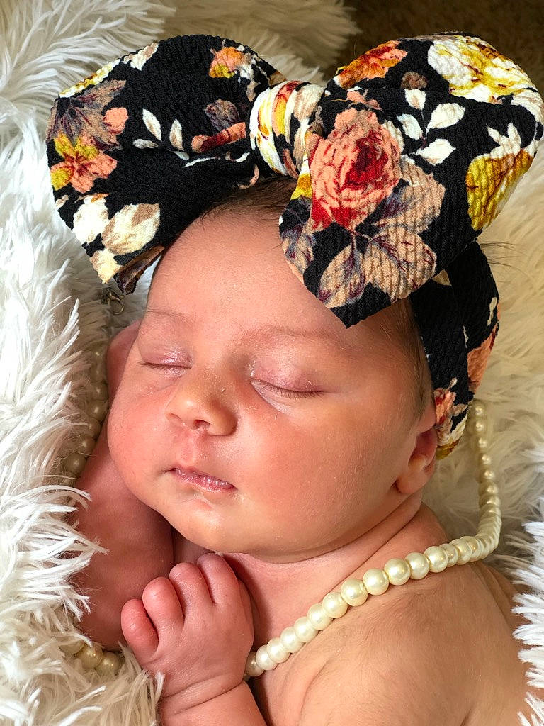 Emmy is registered to the contest to win money with this photo: baby, child, fashion_accessory, hair_accessory, headband, headgear, headpiece, person, toddler