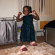 Isibat is registered to the contest to win money with this photo: bodypart, child, clothing, dress, eveningdress, face, female, footwear, formalwear, furniture, girl, head, homedecor, indoors, person, photography, portrait, rug, sandal, shoe