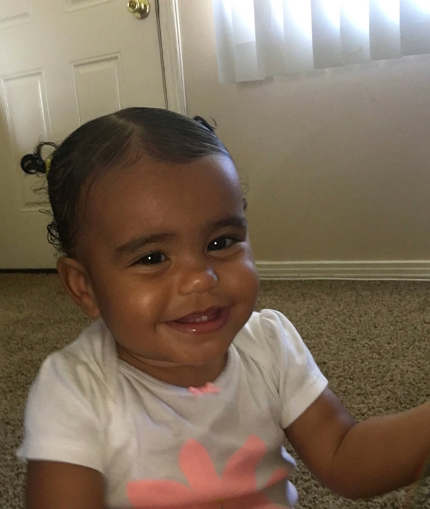 Eleanor Griffith is registered to the contest to win money with this photo: baby, cheek, child, chin, ear, electronic_device, eye, face, facial_expression, forehead, fun, hair, hairstyle, happy, head, joy, lip, person, room, skin