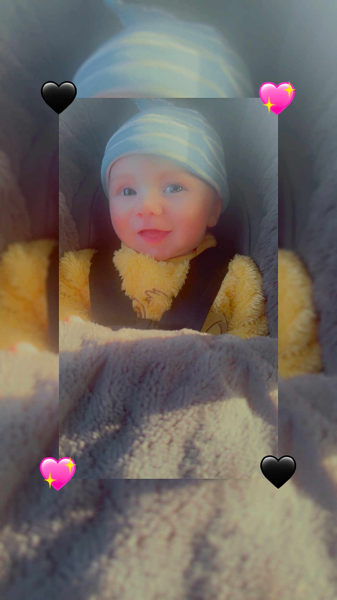 Nico is registered to the contest to win money with this photo: baby, infant, smiling, hat, beanie, blanket, fuzzy_clothing, car_seat, child, cute, portrait, happy, cozy, warm, face, person, indoors, soft_texture, heart_emoji, apparel
