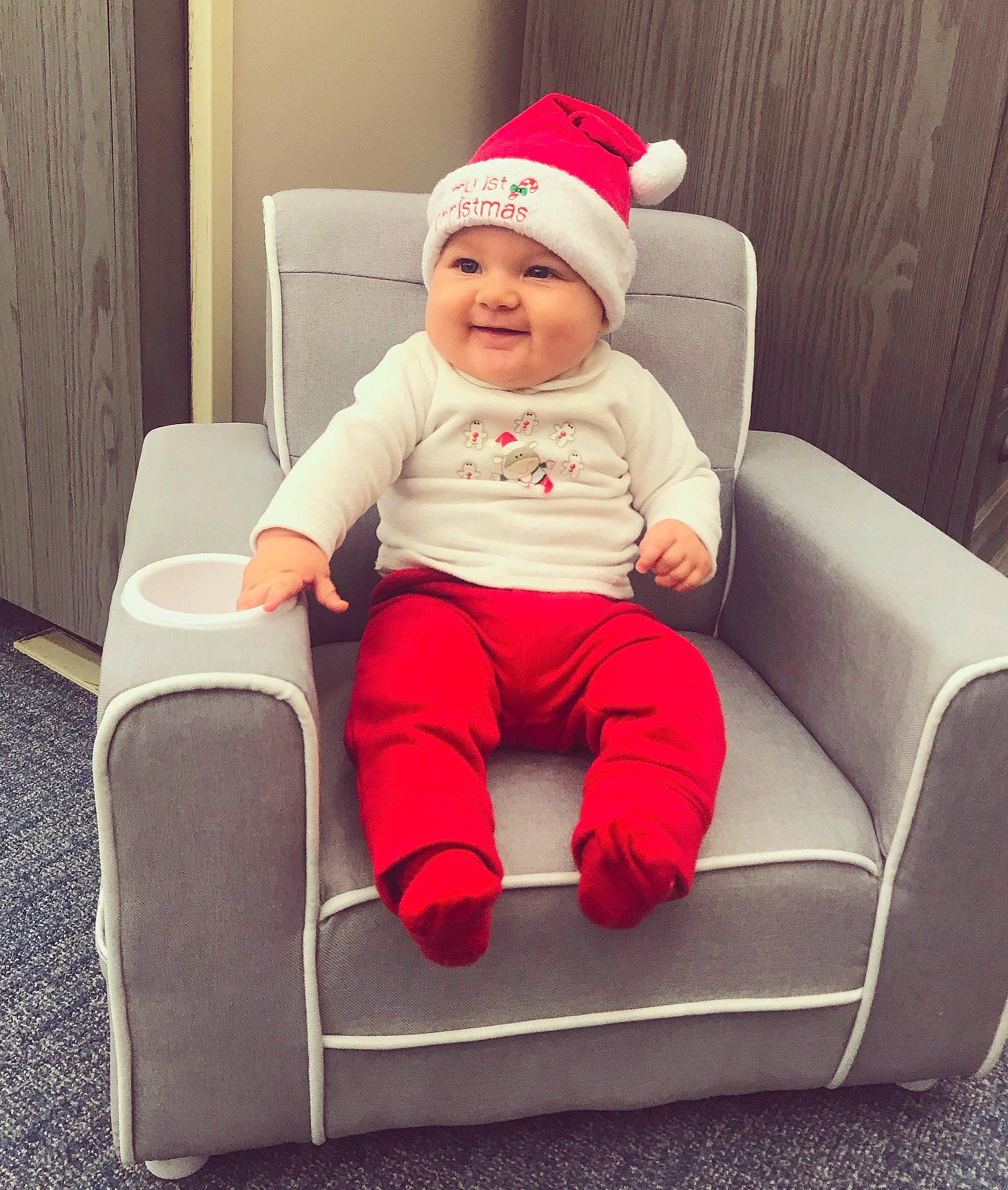 Odette joined the competition — help win amazing prizes! chair, child, day, fun, furniture, headgear, headwear, holiday, infant, joy, lap, person, product, red, sitting, skin, standing, toddler