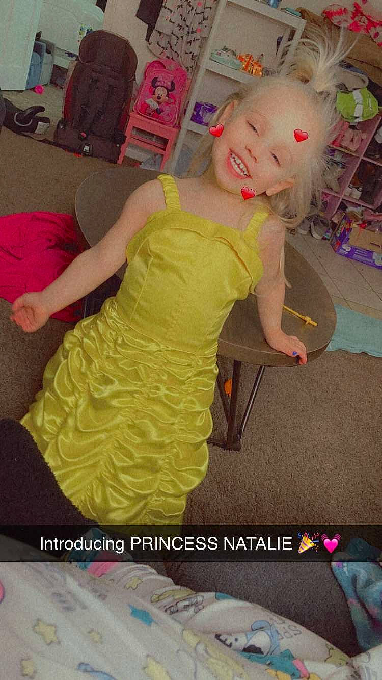 Natalie joined the competition — help win amazing prizes! child, day_dress, dress, event, fashion_design, flooring, formal_wear, fun, happy, head, human_leg, joint, joy, magenta, person, pink, ruffle, sitting, smile, thigh