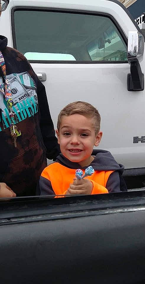 Mason is registered to the contest to win money with this photo: auto_part, automotive_design, automotive_exterior, automotive_lighting, automotive_tire, automotive_wheel_system, automotive_window_part, bumper, family_car, gas, hood, joy, luxury_vehicle, mode_of_transport, motor_vehicle, people, person, smile, t_shirt, vehicle