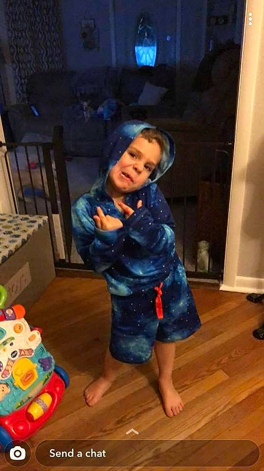 Mason is registered to the contest to win money with this photo: barefoot, blue, child, door, electric_blue, event, floor, flooring, foot, fun, hardwood, human_leg, leisure, person, sitting, standing, toddler, toy, wood, wood_flooring