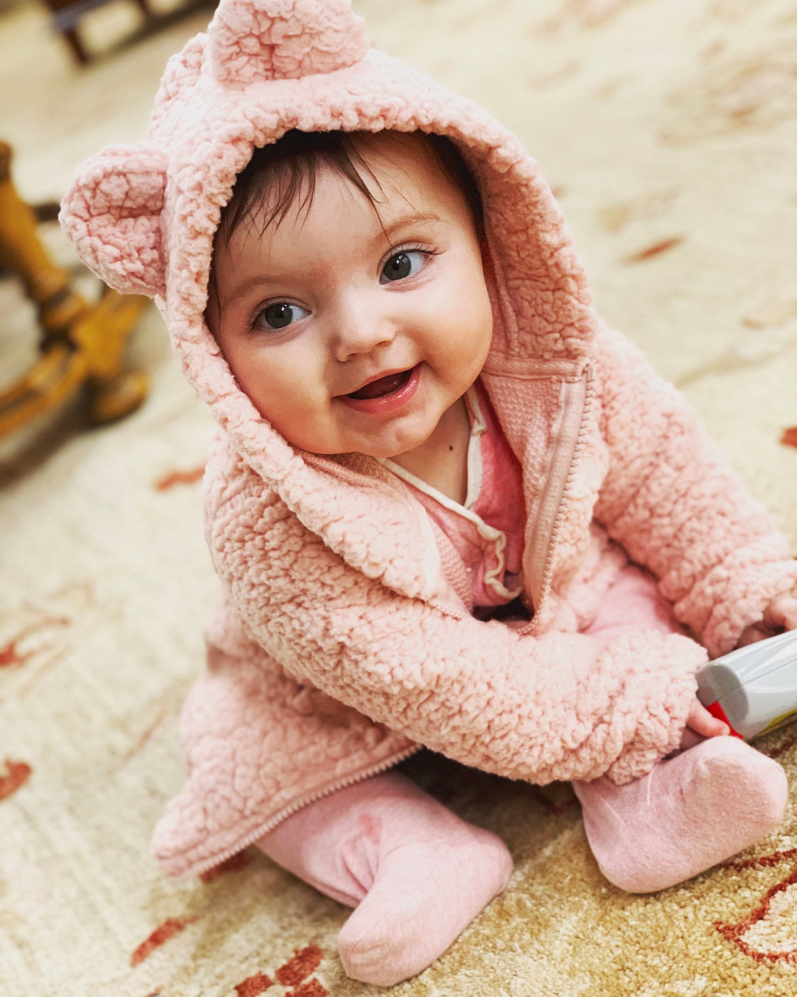 Cassidy joined the competition — help win amazing prizes! baby, beauty, cheek, child, child_model, ear, eye, face, fur, happy, head, headgear, knit_cap, outerwear, person, photography, pink, skin, smile, textile