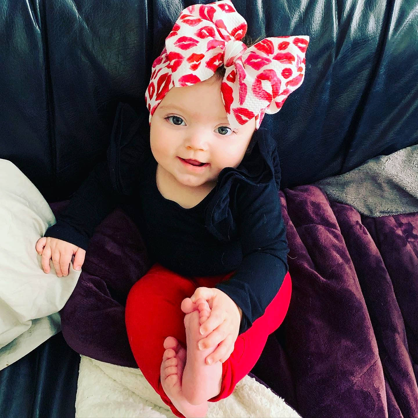 Cassidy is registered to the contest to win money with this photo: baby, baby_products, beanie, child, child_model, clothing, cool, fashion_accessory, finger, hair_accessory, hand, head, headband, headgear, headpiece, headwear, person, photo_shoot, pink, product