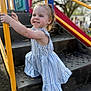 toddler, child, playground, climbing, dress, striped_dress, yellow_railing, stairs, outdoor, smiling, happy, summer, daylight, play, fun, person, young_child, casual_clothing, park, nature