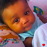 Tru joined the competition — help win amazing prizes! baby, blanket, child, close_up, colorful, cozy, curly_hair, cute, eyes, face, indoors, infant, person, portrait, resting, skin, smile, soft_lighting, toddler, young