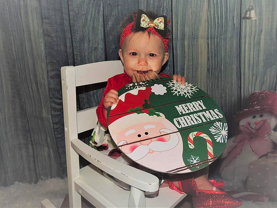 Lyla is registered to the contest to win money with this photo: baby, baby_products, baby_safety, baby_toddler_clothing, baby_toys, christmas, costume_accessory, fictional_character, hair_accessory, headband, headpiece, headwear, holiday, person, stuffed_toy, toy