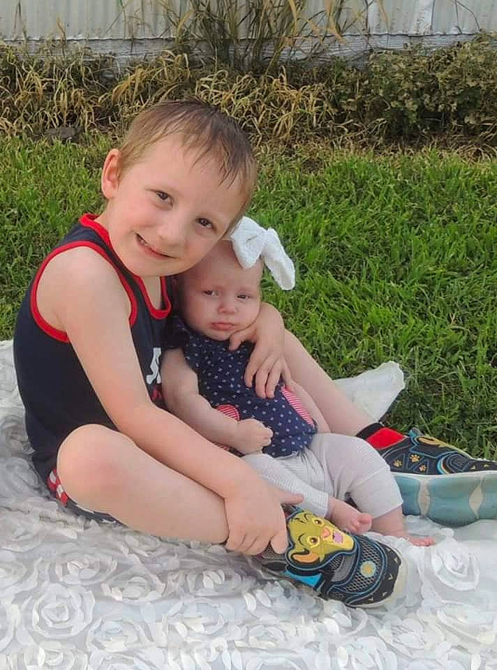 Brayton joined the competition — help win amazing prizes! baby, baby_toddler_clothing, bowl, child, foot, head, headwear, human_body, joy, lap, love, nose, overall, person, sandal, shoe, slipper, sock, summer, toddler