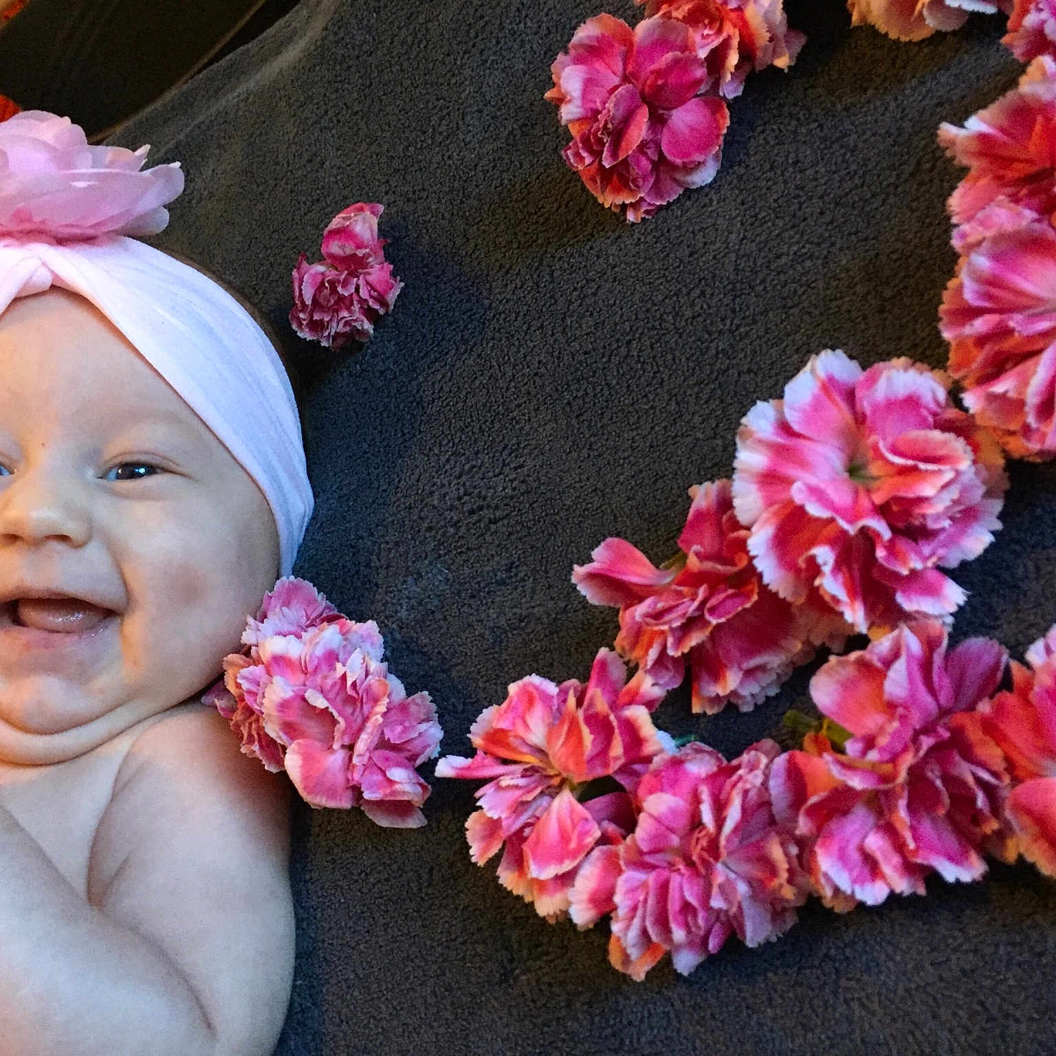 Carly joined the competition — help win amazing prizes! baby, baby_toddler_clothing, bonnet, child, cut_flowers, fashion_accessory, flower, hair_accessory, headband, headgear, headpiece, person, petal, pink, plant, spring, toddler