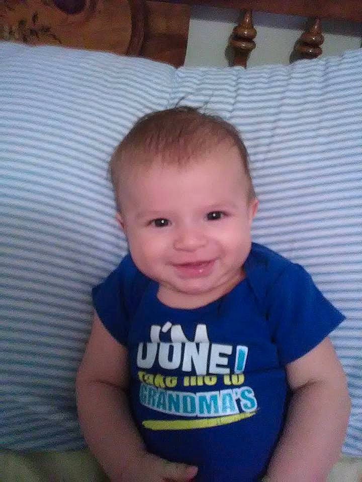 Aaron is registered to the contest to win money with this photo: boy, cheek, child, chin, day, eye, face, facial_expression, forehead, hair, hairstyle, head, human_hair_color, infant, joy, nose, person, product, skin, smile