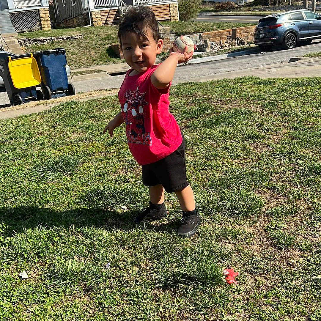 Amir is registered to the contest to win money with this photo: architecture, backyard, ball, baseball, baseballball, building, clothing, face, grass, head, nature, neighborhood, outdoors, person, photography, plant, portrait, shelter, sport, yard