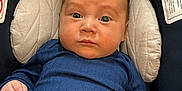 Elijah joined the competition — help win amazing prizes! baby, infant, blue_clothing, car_seat, chicco_brand, safety_harness, seat_padding, infant_face, child, serious_expression, indoor, closeup, head_support, baby_hands, newborn, baby_gaze, car_safety, child_seat, baby_boy, soft_lighting