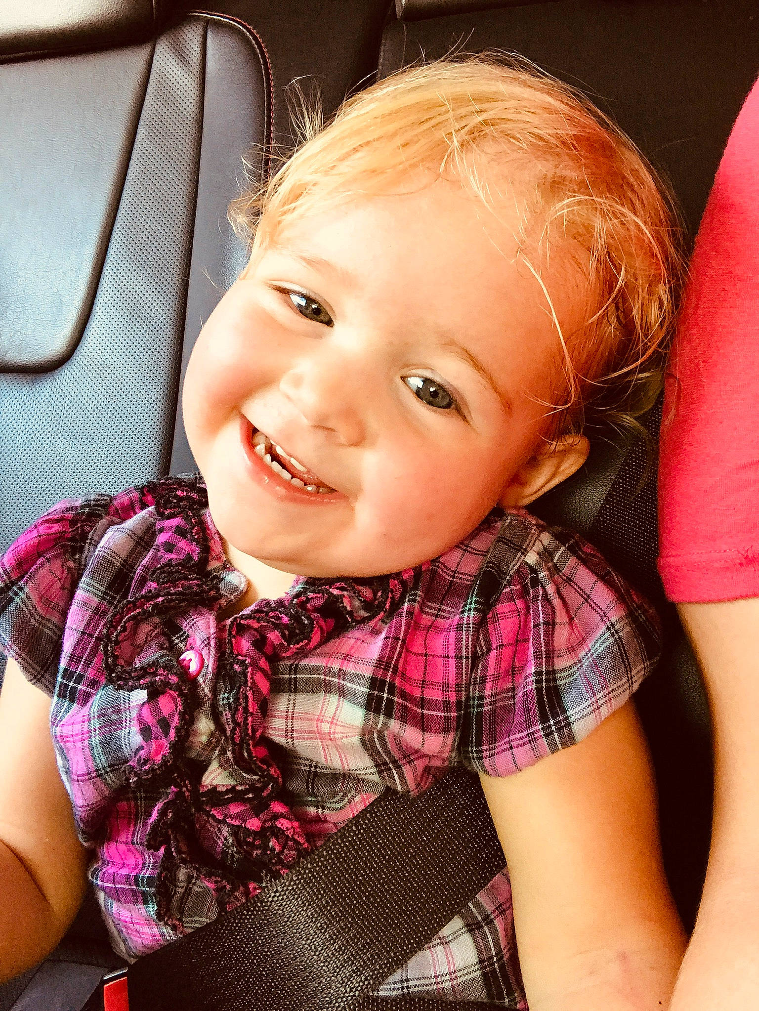 Skai is registered to the contest to win money with this photo: baby, beauty, blond, cheek, child, chin, design, eye, face, hair, head, joy, lip, nose, pattern, people, person, pink, plaid, skin