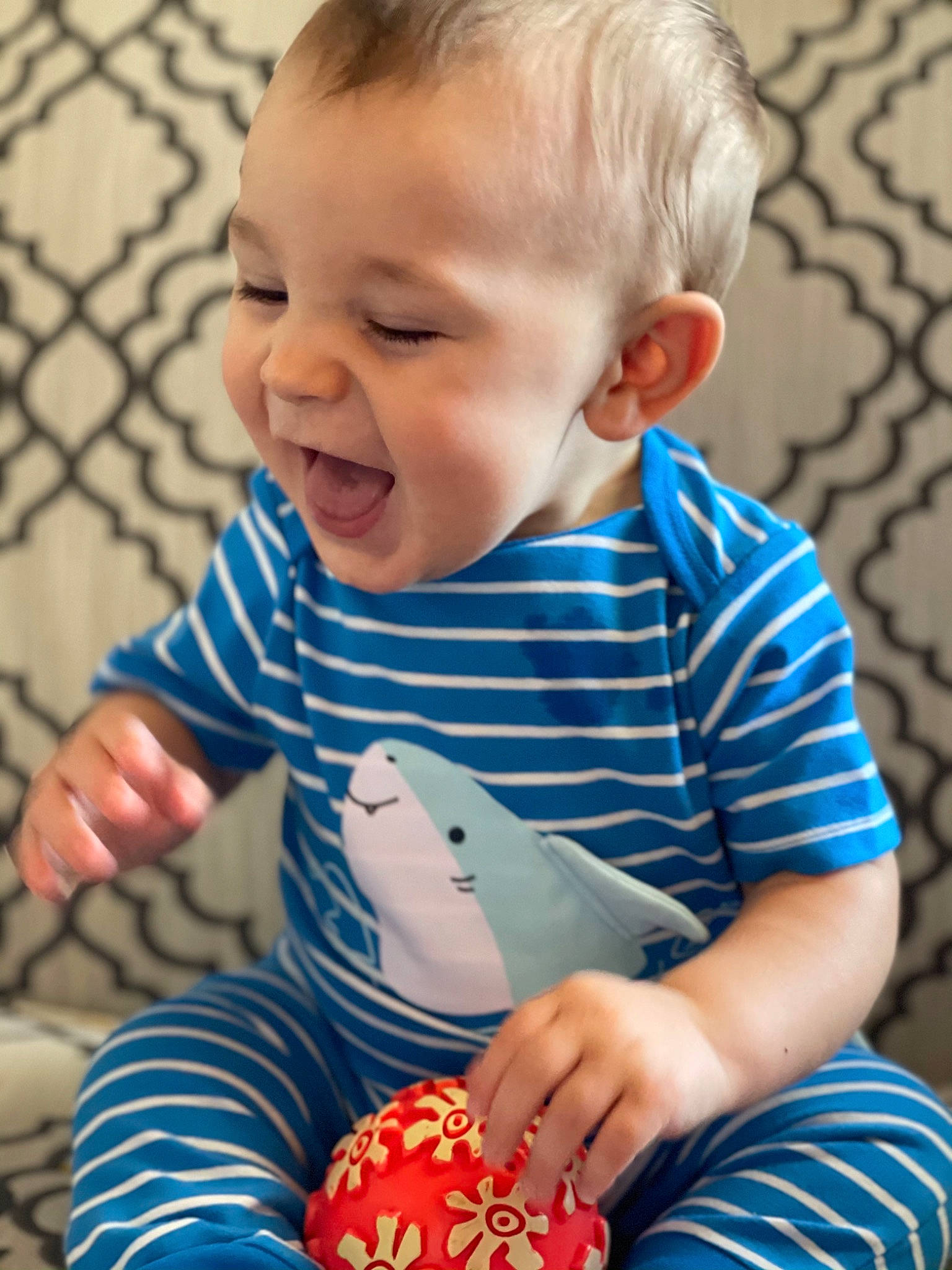 Wilder joined the competition — help win amazing prizes! arm, baby_playing_with_toys, baby_toddler_clothing, blue, cheek, dress, eye, face, hand, head, human_body, iris, mouth, nose, organ, person, product, skin, sleeve, smile
