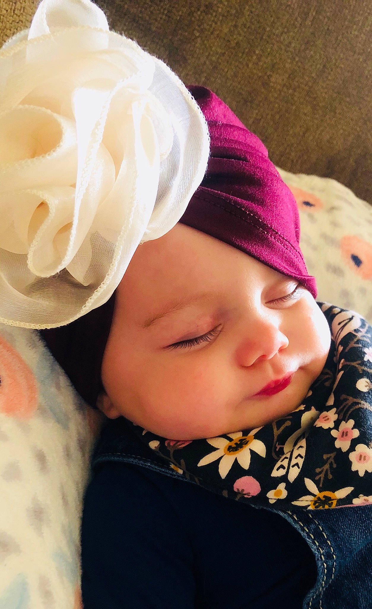 Melina is registered to the contest to win money with this photo: baby, beanie, cheek, child, ear, fashion_accessory, hair_accessory, hat, headband, headgear, headpiece, person, pink, toddler
