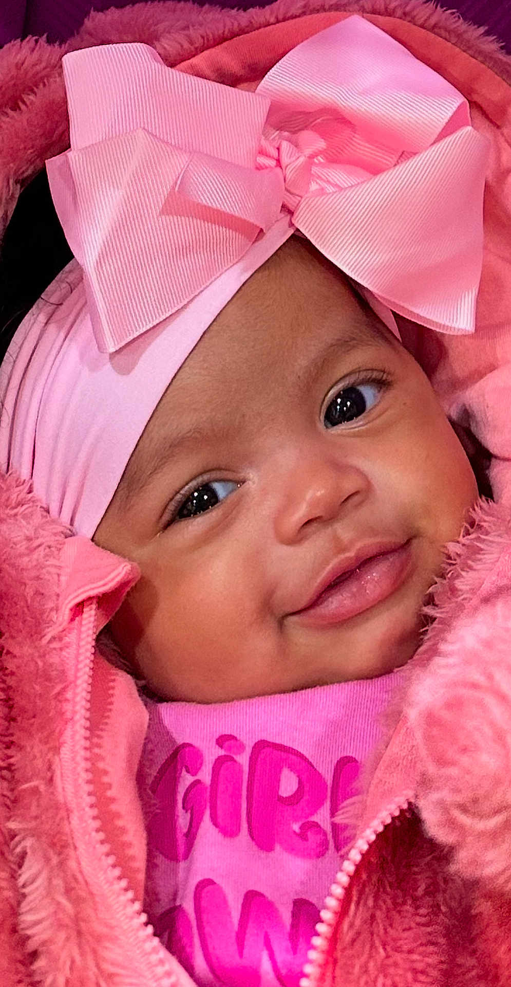 Trenity joined the competition — help win amazing prizes! baby, bonnet, cap, clothing, coat, face, happy, hat, head, hood, hoodie, jacket, knitwear, newborn, person, photography, portrait, purple, smile, sweater